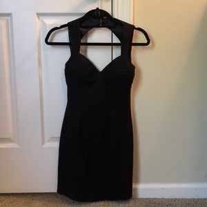 STUNNING fitted open back black Bebe dress